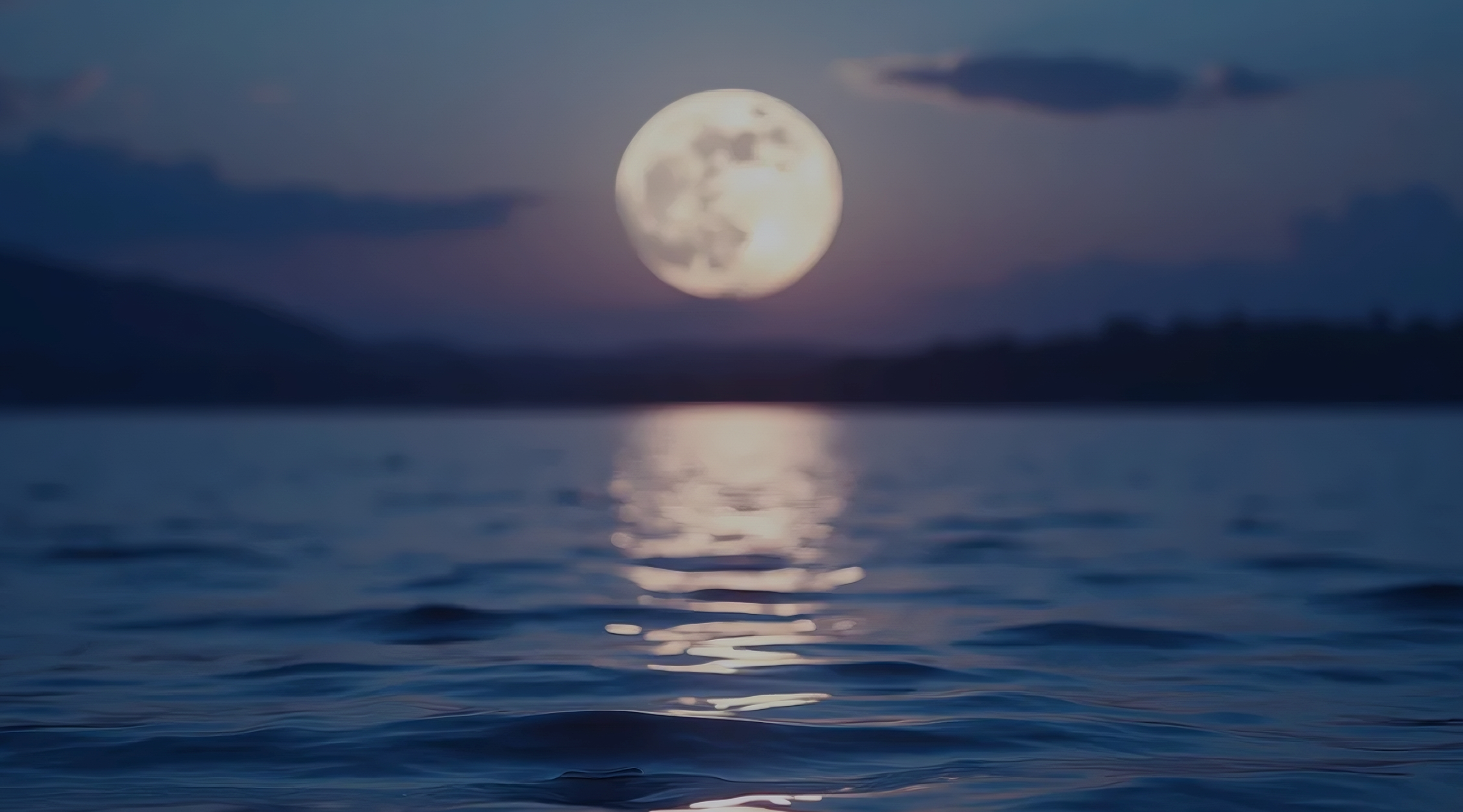 A calm moon on a lake